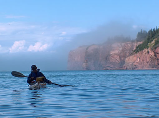 Kayaking off the spectacular coast of Cape Chignecto Provincial Park.